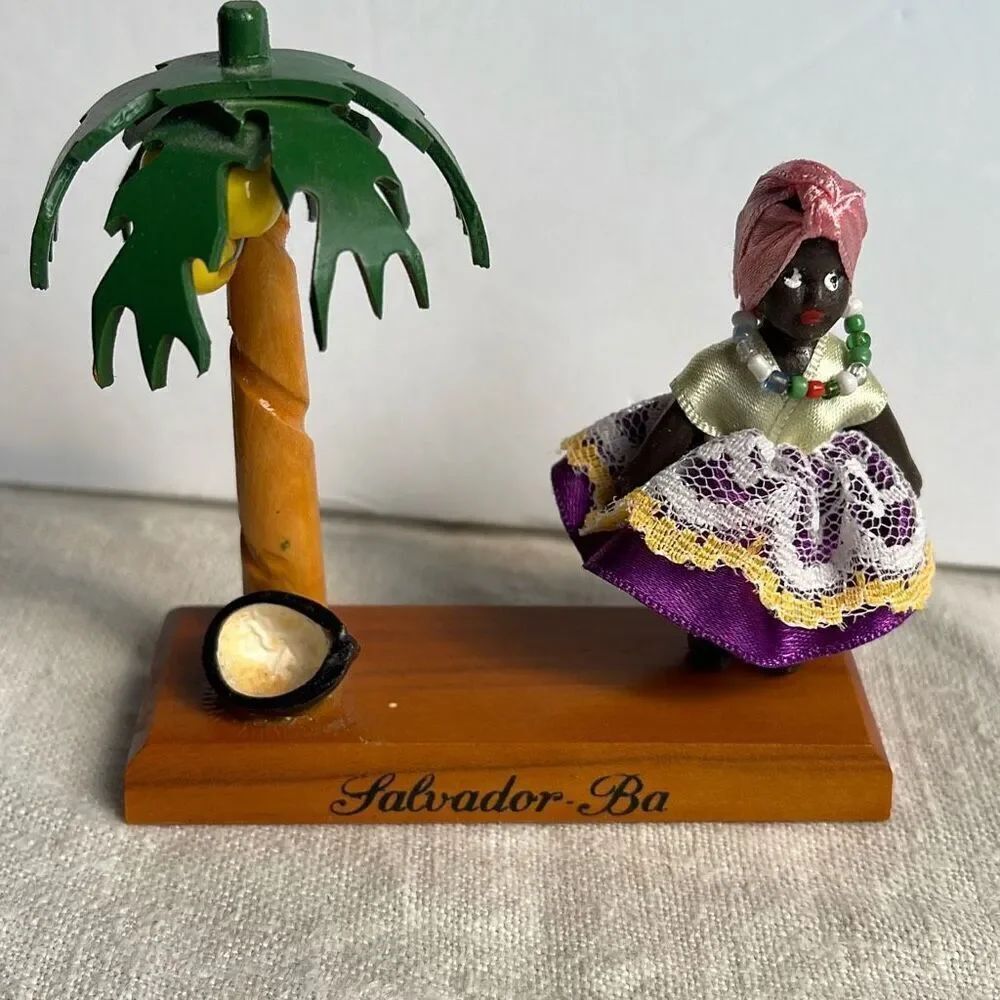 Salvador, Bahia vintage tourist figurine. Girl in native dress and coconut tree.